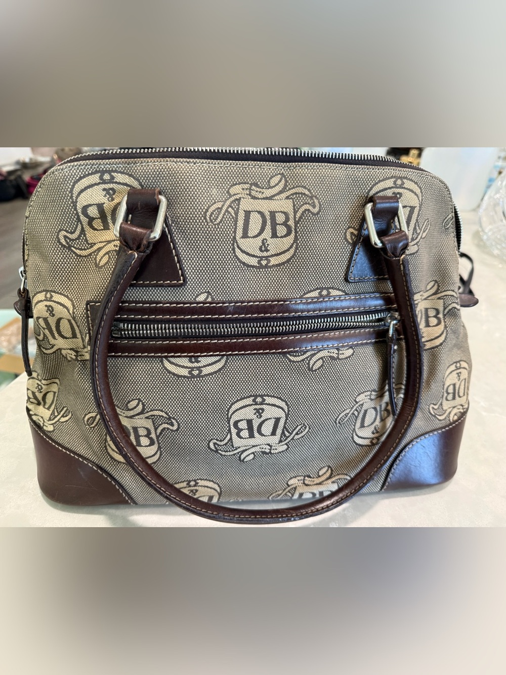 Dooney & Bourke Brown
Signature Donegal Crest Dome
Satchel, Used & Vintage - Picture 2 of 9